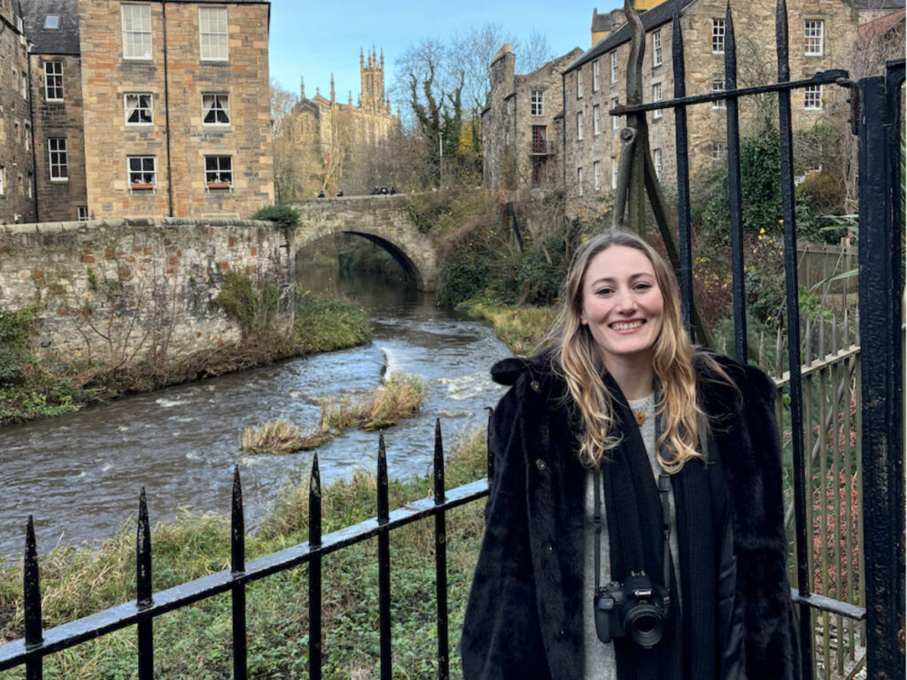 The author Sky Ariella on the Dean Village in Edinburgh