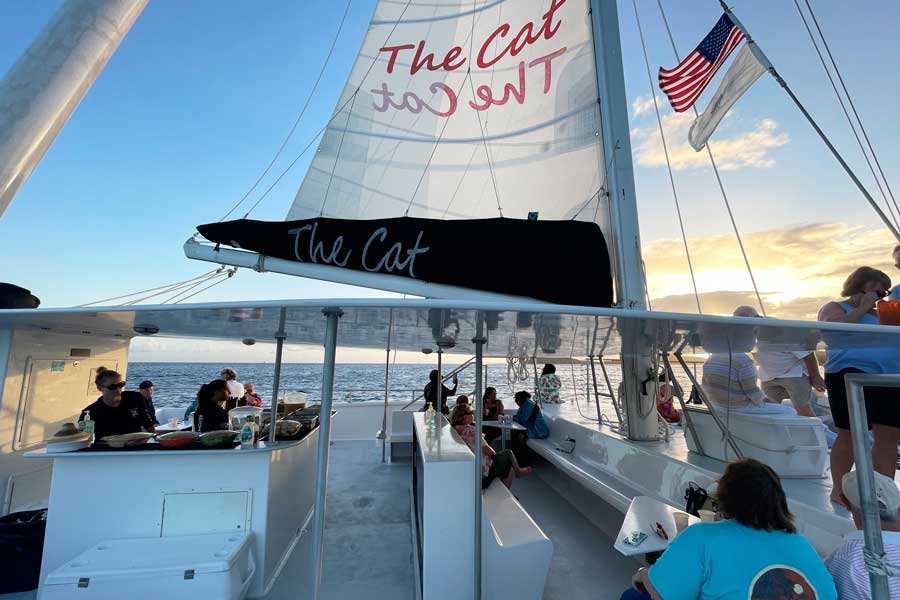 View of people at the deck of VI Cat