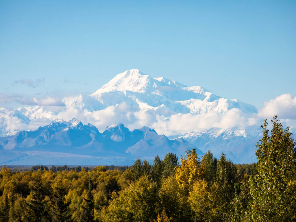 The Denali Mountain from afar topped with snow