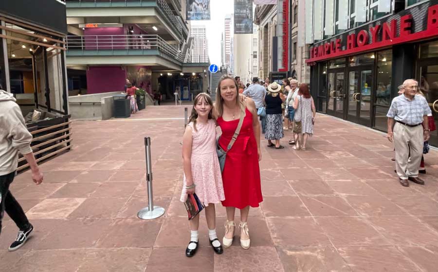 The author with her daughter all dressed up at the Denver Performing Arts Complex
