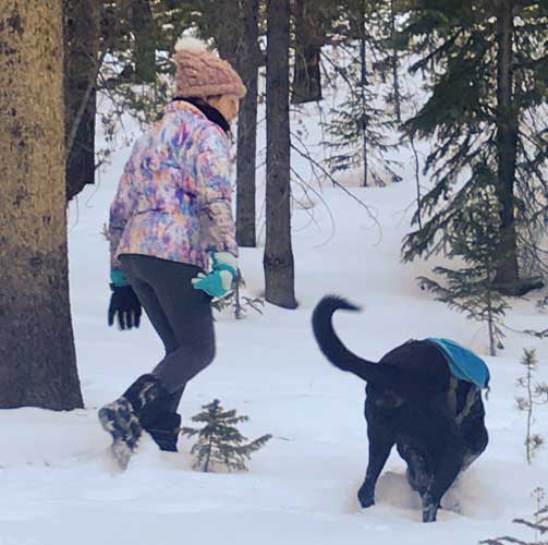 The author with her dog during a hike during winter season