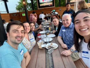 People smiling for a photo during the Travel Lemming's Denver Meetups