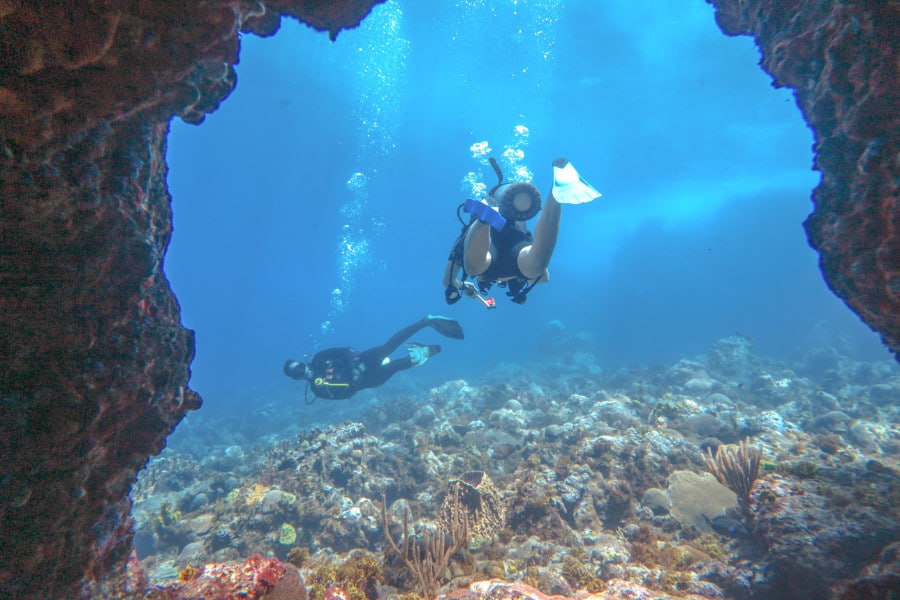 Two divers exploring Desecheo Caves