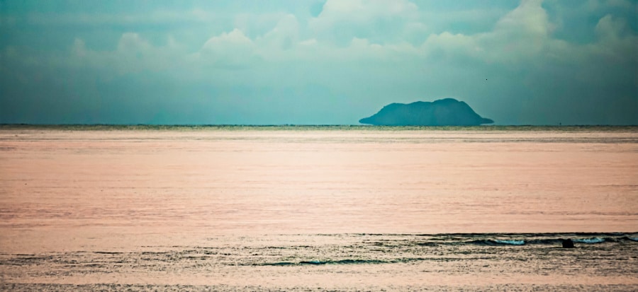 View of Desecheo Island seen across the sea during sunset