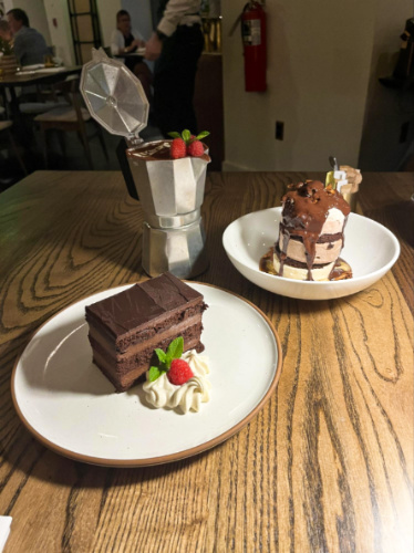 Variety of chocolate desserts placed on the table at Luogo
