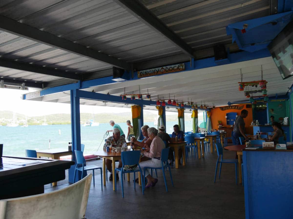 People enjoying their food and view at the Dinghy Dock