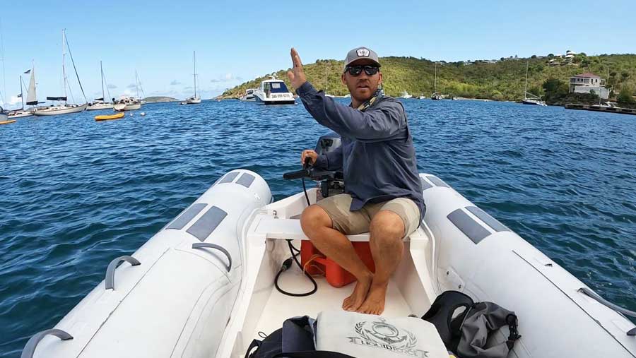 The author driving a dingy rental in St. John