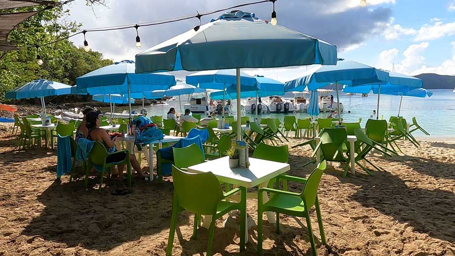 People enjoying their day in Dinghy’s Beach Bar & Grill during a sunny day