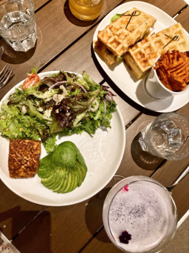 A plate of vegetables and waffles from D Bar Denver