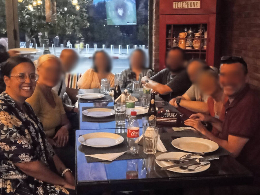 The author Catherine Driver having a farewell dinner with her group tour at Marrakech