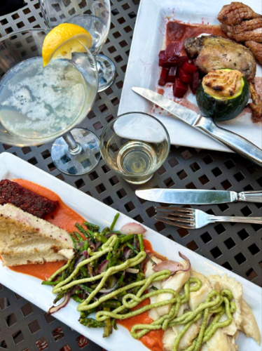 A plate of beet cakes with almond milk polenta and pan-seared duck at Hearthstone Restaurant