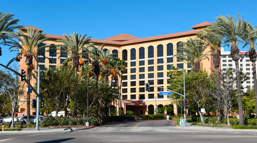 A Disney hotels under the clear blue sky on Harbor Boulevard
