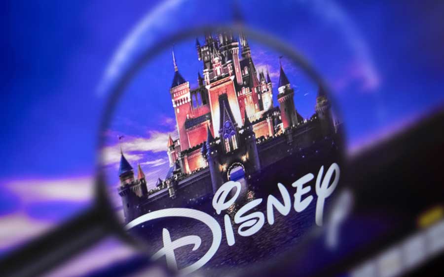 The Disney logo through a magnifying glass
