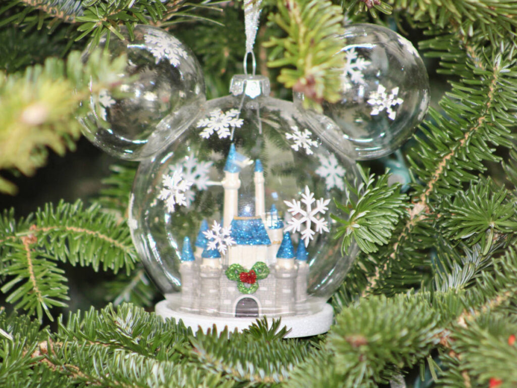 View of a Disney ornament on a Christmas tree