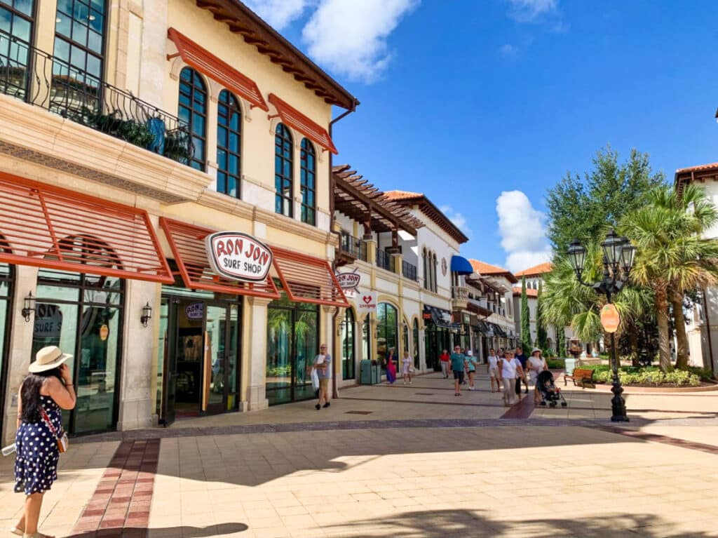 View of the people walking along the shops in Shops in Disney Springs