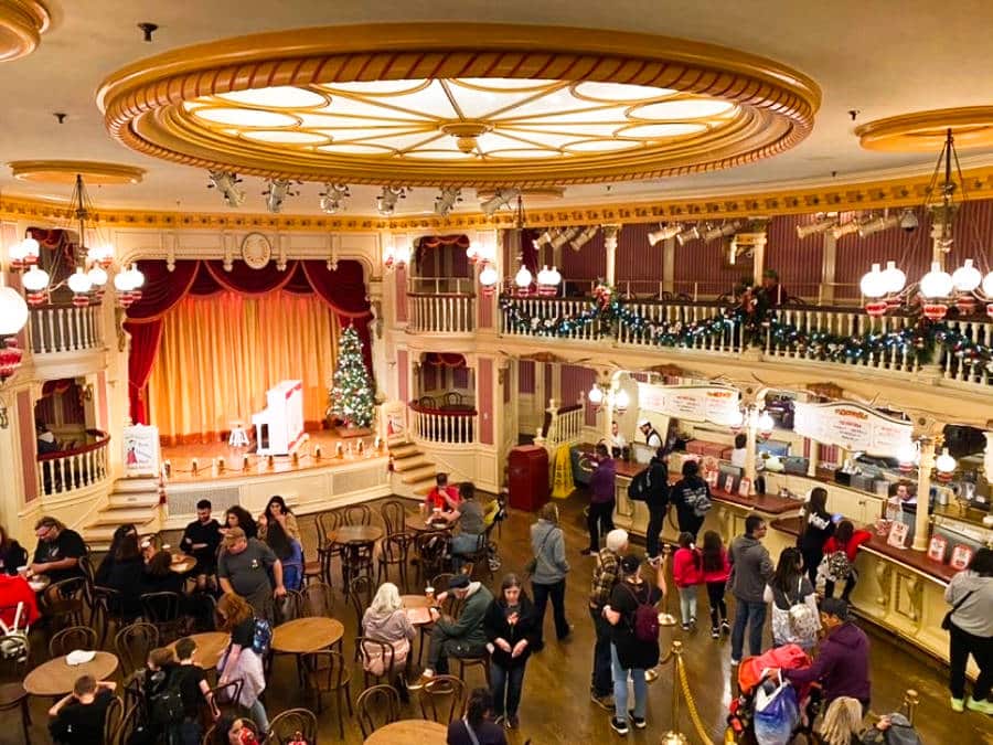 View inside the busy restaurant from the top floor of Disneyland during the Christmas season