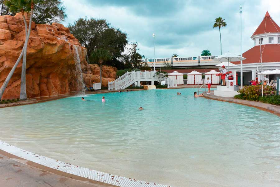 People enjoying in the pool area of Lobby Area in Disney’s Grand Floridian Resort & Spa