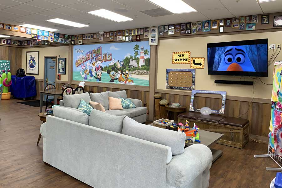 Couch and television on a living room in Entrance to Disney’s Old Key West Resort