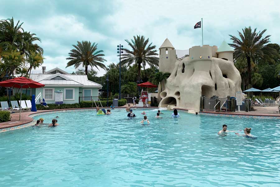People enjoying their day in a pool in Disney’s Old Key West Resort