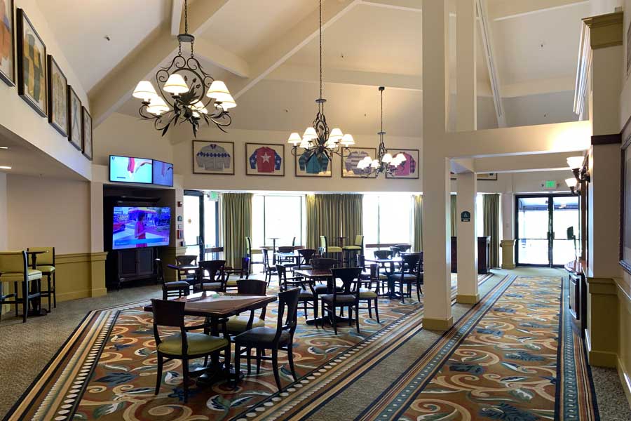Tables and chairs inside the Disney’s Saratoga Springs Resort & Spa