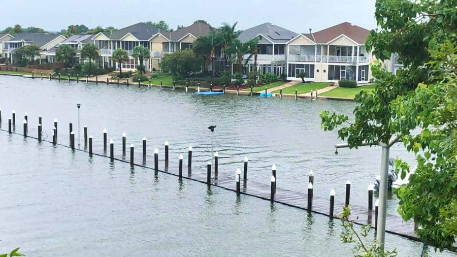 View of the boardwalk submerged by summer rains in Lake Pontchartrain