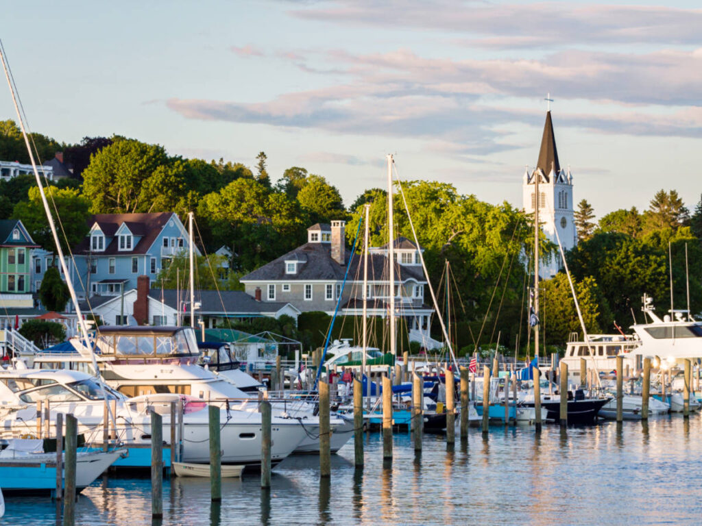 View of the docked boats and greenery in Mackinac Island