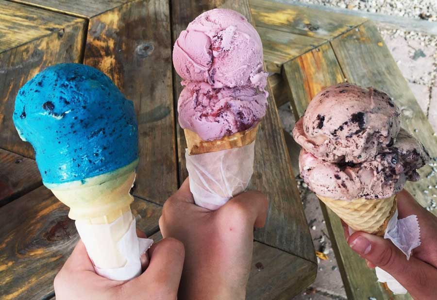 Different flavors of ice cream on a cone served in Dolly’s Dairy Bar