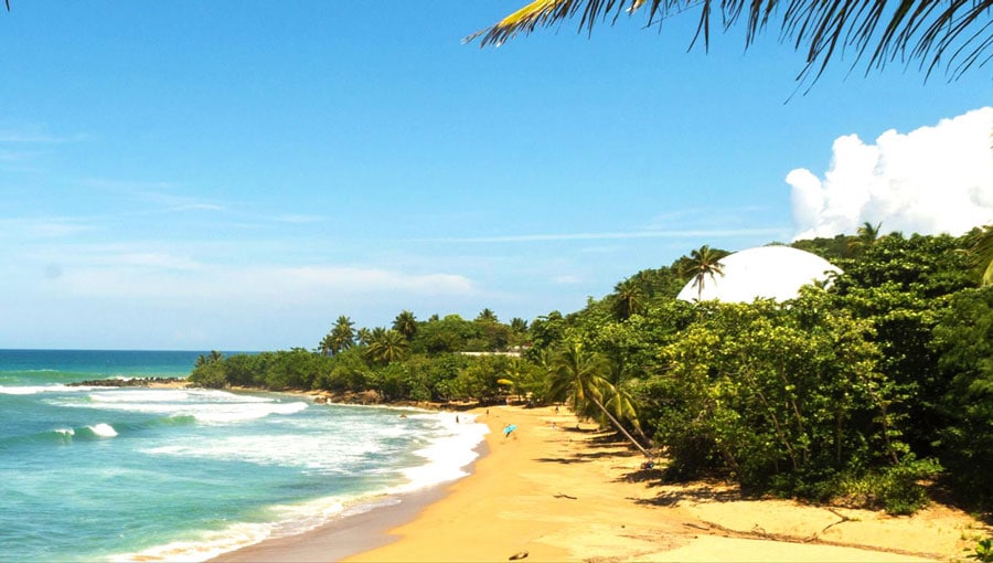 The clear blue sky in Domes Beach in Rincon