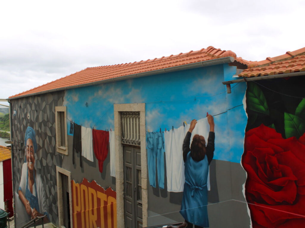 View of the colorful Dona Rosa murals in Porto