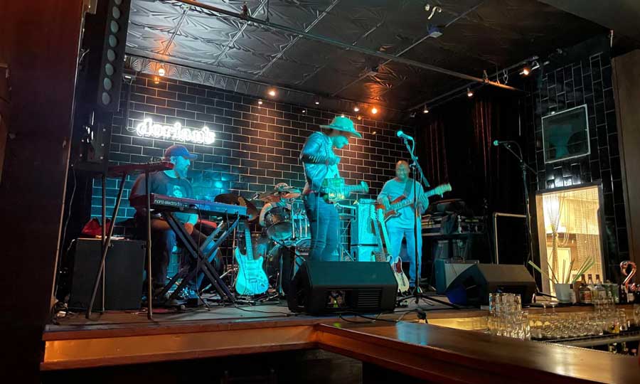 View of Ivan Singh performing inside Dorian's
