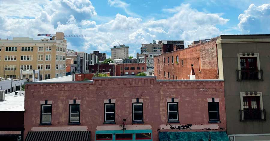 View of buildings under the clear blue sky in Downtown Asheville