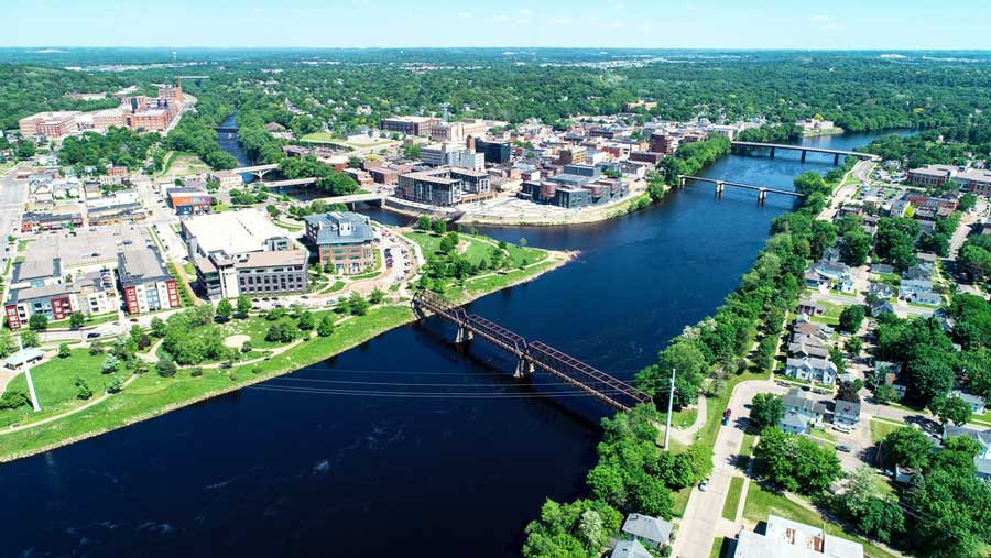 Aerial view of the Downtown Eau Claire and the bridge in it