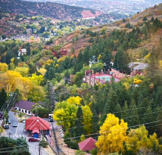 View of downtown Manitou Springs with changing Aspen leaves