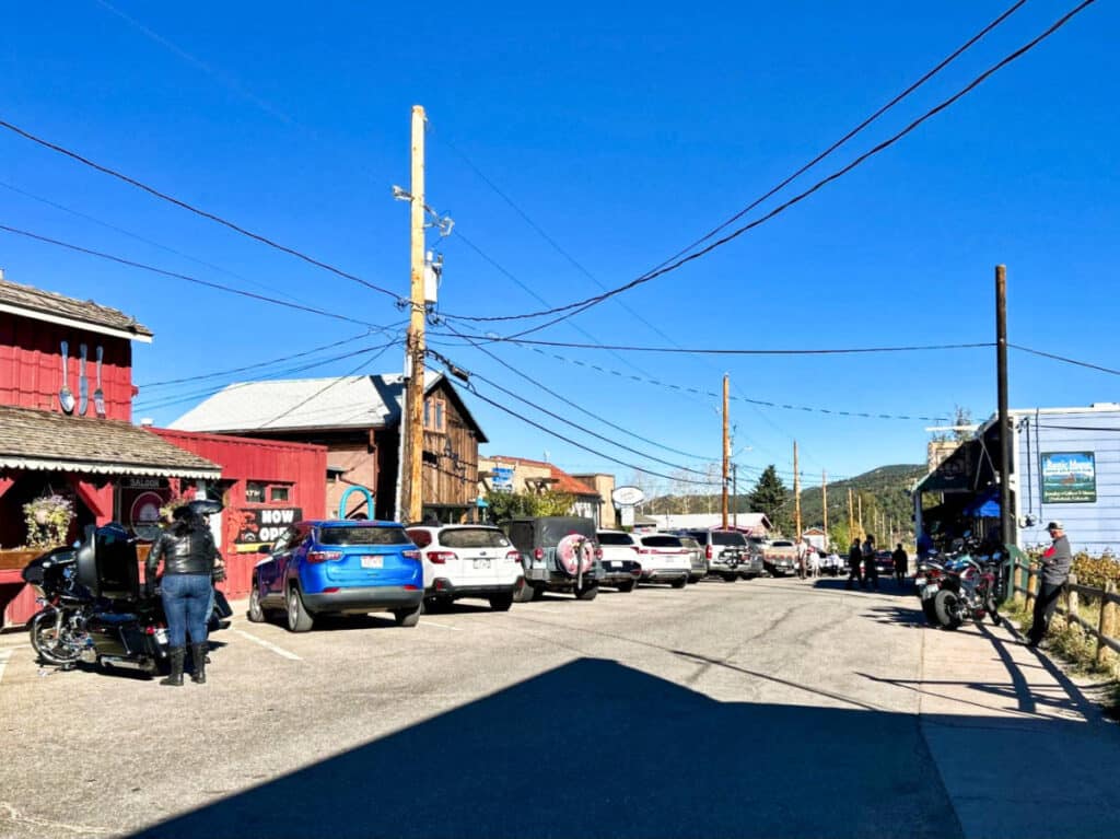 View of the parked cars outside the shops at Downtown Nederland