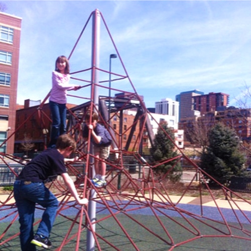 View of children playing in a playground in Denver