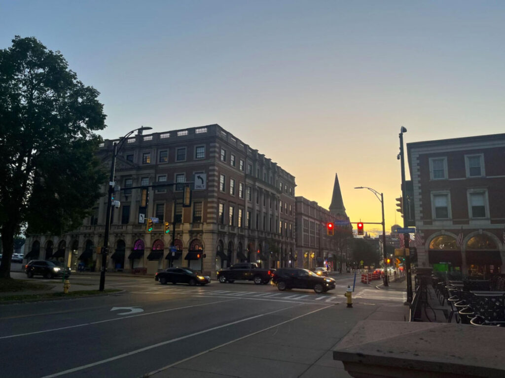 View of a street at Downtown Rochester during sunset