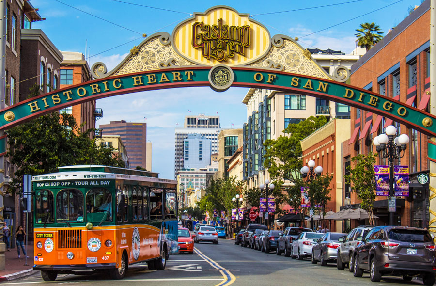 View of cars parked in Downtown San Diego and the welcoming arch