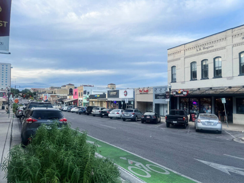 Cars parked on a street in Downtown San Marcos