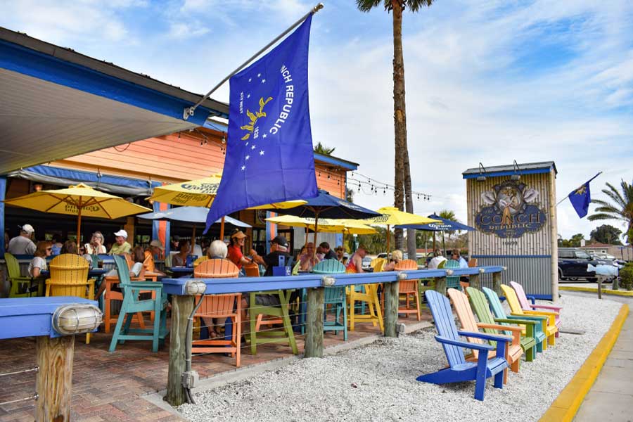 Crowded colorful bar in the beach area of Downtown St. Pete