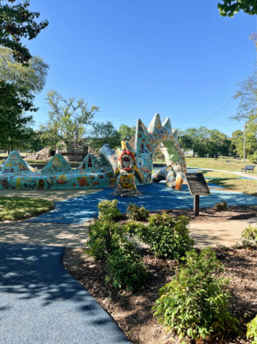 The mosaic dragon sculpture in Fannie Mae Dees Park