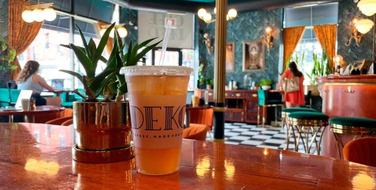 A cup of iced black currant tea with lemonade in Cafe Deko