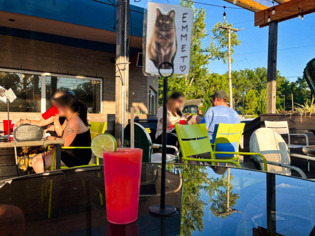 A glass of drink at the outdoor patio of Redhead Stranger