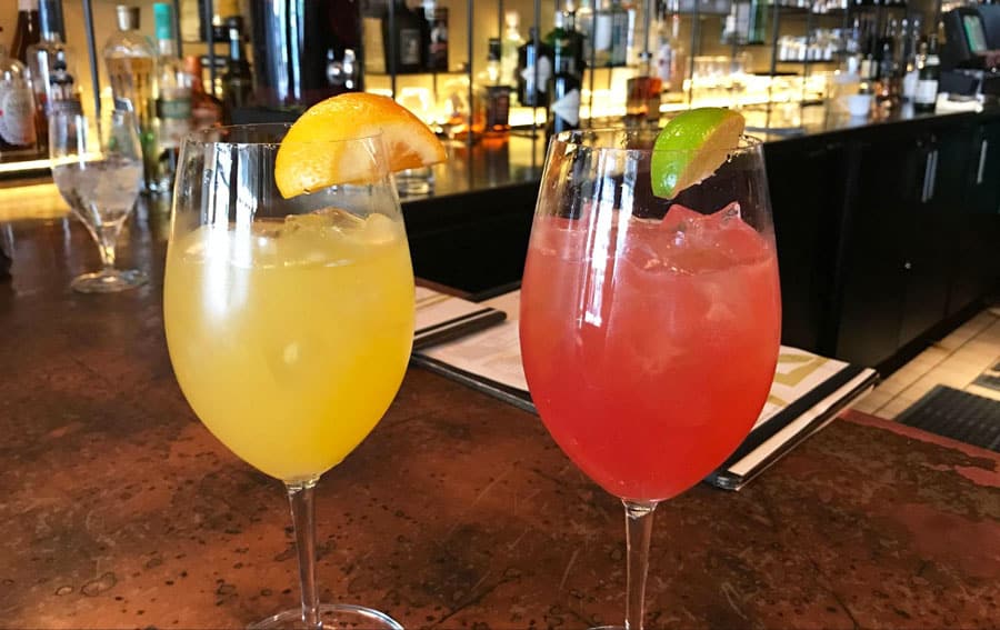Two glasses of sangria with lemon and lime