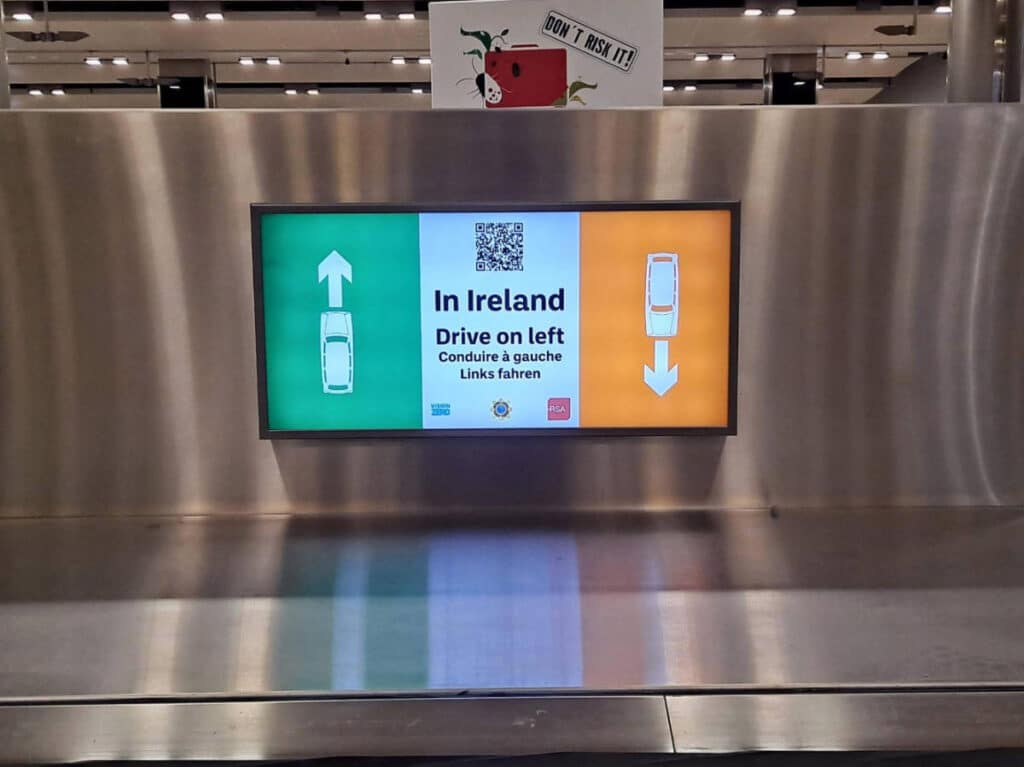 A signage that shows the driving position in Ireland