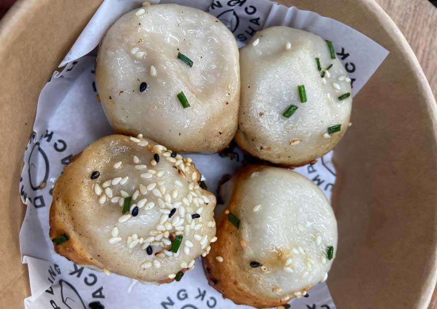Dumplings on a bowl served in Dumpling Shack