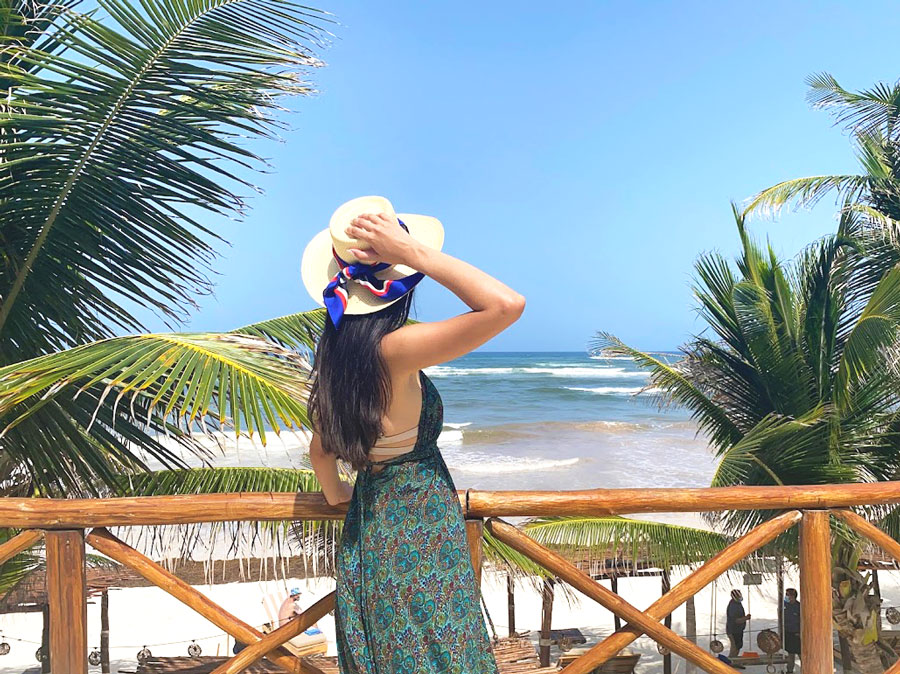 Clara admiring the ocean in Dune Boutique Hotel
