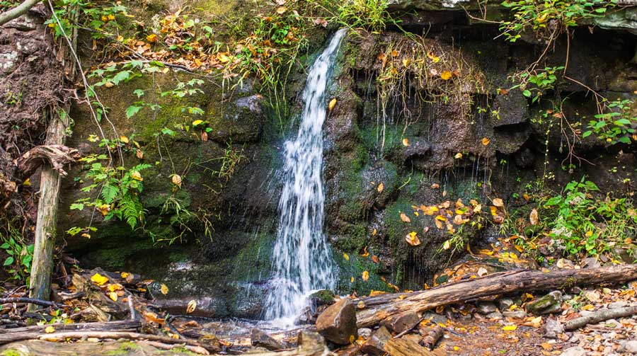 View of the Dunnfield Creek Waterfall during fall season