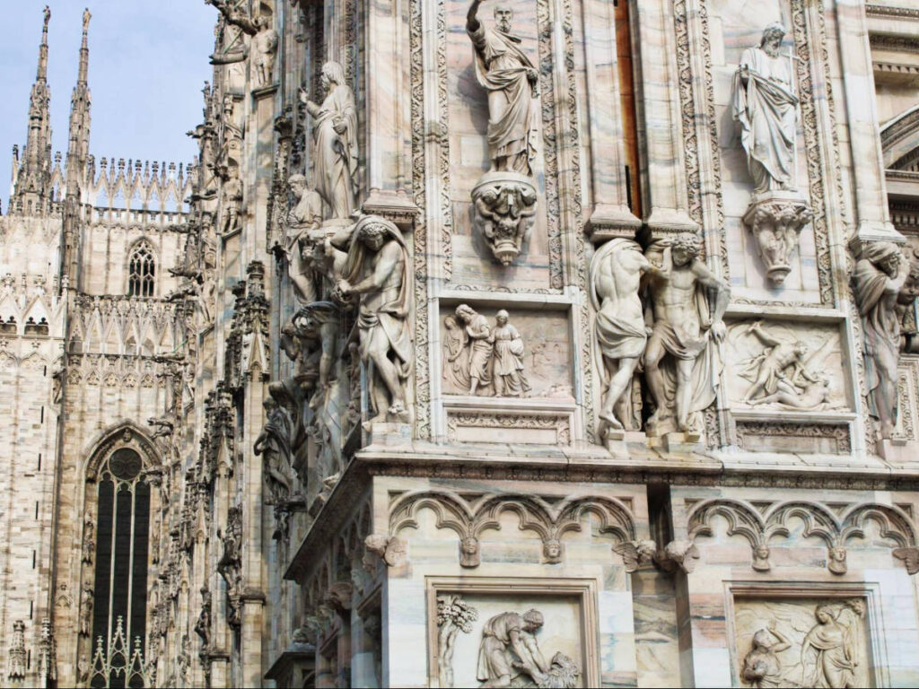 Closeup look of the intricate exterior of Duomo Di Milano in Milan