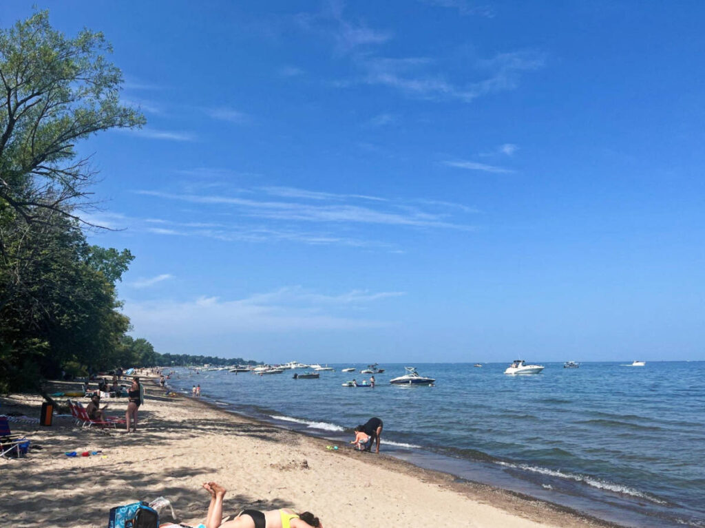 People enjoying their day at the Durand Eastman Park