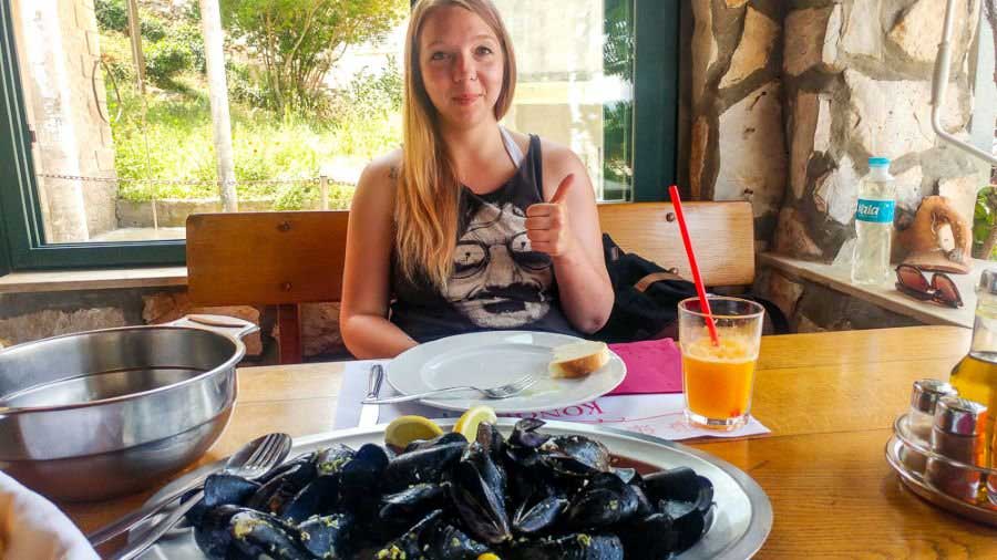 The author, Taylor Herperger eating on a restaurant